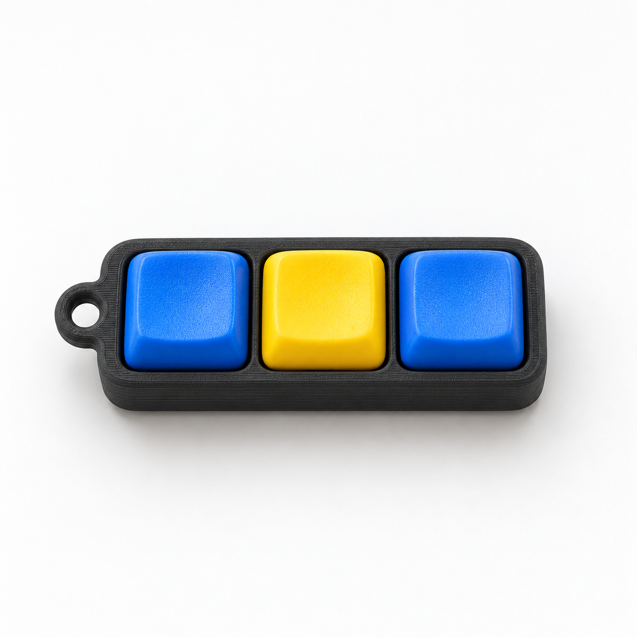 Voorbeeld van een clicker met drie blauwe en gele toetsen